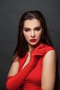 Sensual beautiful brunette woman posing in red dress Royalty Free Stock Photo