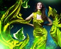 Sensual beautiful woman in green fabric Royalty Free Stock Photo