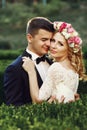 Sensual beautiful young blonde bride and handsome groom hugging Royalty Free Stock Photo