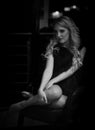 Sensual blonde woman posing in shadows at night Royalty Free Stock Photo