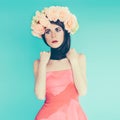 Sensual brunette lady with floral wreath on her head. Royalty Free Stock Photo