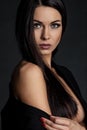 Sensual brunette lady portrait on black background Royalty Free Stock Photo