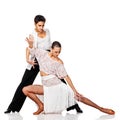 Sensual couple dancing salsa. Latino dancers in action. Isolated Royalty Free Stock Photo