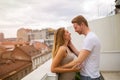 Sensual couple rooftop romance