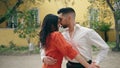 Sensual dancers practicing samba on city street close up. Couple dancing latino