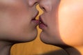 Sensual girls couple kiss, close up. Young female Woman kissing. Affection LGBT. Beautiful macro female lips.