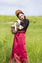 Sensual Glamour Model in Russian Style Kokoshnik Holding Newborn Lamb Cub Against Nature Background Royalty Free Stock Photo