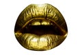 Sensual golden woman lips. Womans gold lip. Female mouth close up with golden lipstick. Glossy luxury mouth.