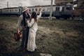 Sensual hipster couple, gypsy woman in boho clothes and musician Royalty Free Stock Photo