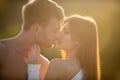 Sensual kiss. Man kissed tender woman. Portrait of lovely couple in love. Young sensual girlfriend glad to passionate Royalty Free Stock Photo