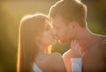 Sensual kiss. Man kissed tender woman. Portrait of lovely couple in love. Young sensual girlfriend glad to passionate Royalty Free Stock Photo