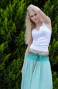 Sensual lady wears blue long skirt