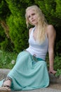 Sensual lady wears blue long skirt