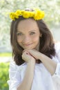 Sensual lovely woman with dandelion wreath