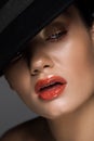 sensual model with makeup posing in black felt hat Royalty Free Stock Photo