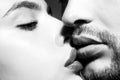 Sensual passionate couple kissing lips. Closeup of couple mouths kiss.