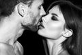 Sensual portrait of young couple in love. Sensual kiss closeup. Man kissed tender woman. Loving couple embracing and Royalty Free Stock Photo