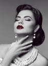 Sensual red lips. Elegant passion retro woman portrait with fashion jewelry set. Black and white vintage photo. Royalty Free Stock Photo