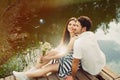 Sensual romantic couple in love on pier at the lake in summer da Royalty Free Stock Photo