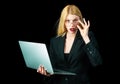 Sensual secretary business woman holding laptop, black isolated. Gorgeous blond secretary woman working in office Royalty Free Stock Photo