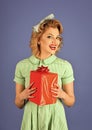 Sensual woman. Retro woman with present box, pinup.