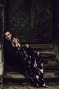 Sensual stylish couple portrait on old stone stairs in Barcelona Royalty Free Stock Photo