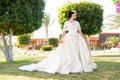 Sensual woman in white wedding dress. Woman with jewelry diadem on brunette hair. Bride with makeup face. Beauty girl with glamour Royalty Free Stock Photo