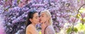 Sensual woman spring outdoor portrait banner. Spring girls. Lesbian couple kissing. Beautiful spring sexy girl with Royalty Free Stock Photo