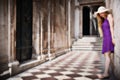 Sensual young woman and ancient building