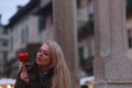 Sensual young woman eyeing a toffee apple with anticipation Royalty Free Stock Photo