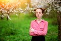 Sensuality. Happy beautiful young woman relaxing in blossom park