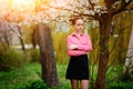 Sensuality. Happy beautiful young woman relaxing in blossom park