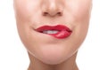 Sensuous woman biting red lips. Royalty Free Stock Photo