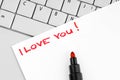 Sentence I love you written on paper. Royalty Free Stock Photo