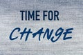 Sentence Time for change on a light jeans structure Royalty Free Stock Photo
