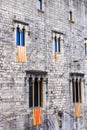 The Senyera Flag of Catalonia displayed outside windows Royalty Free Stock Photo