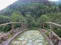 Senyuva stone bridge over Firtina Stream with landscape view in Camlihemsin, Rize, Turkey. Royalty Free Stock Photo