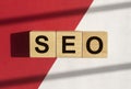 SEO acronym. Search engine optimization word on cubes