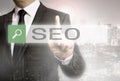 SEO Browser with businessman and city concept Royalty Free Stock Photo