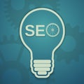 Seo concept with bulb and gears Royalty Free Stock Photo