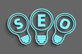 Seo concept with bulb and gears Royalty Free Stock Photo