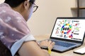 SEO concept. A young businessman using a tablet on the desk Royalty Free Stock Photo