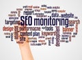 SEO monitoring word cloud and hand with marker concept