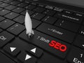 SEO rocket on top of a keyboard Royalty Free Stock Photo