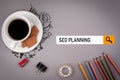 SEO Search Engine Optimization concept. Gray office desk with the inscription Royalty Free Stock Photo