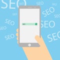SEO search engine optimization concept. Hand holding phone searching seo on the internet.