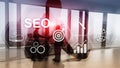 SEO - Search engine optimization, Digital marketing and internet technology concept on blurred background. Royalty Free Stock Photo