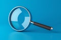 SEO search engine optimization magnifying glass on a blue background