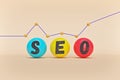 Search Engine Optimization ranking concept with multicolored balls. minimal style on pastel background. 3d rendering