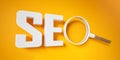 SEO, Search Engine Optimization text and magnifying glass on bright yellow background. Idea, Vision, Strategy, Analysis, Keyword